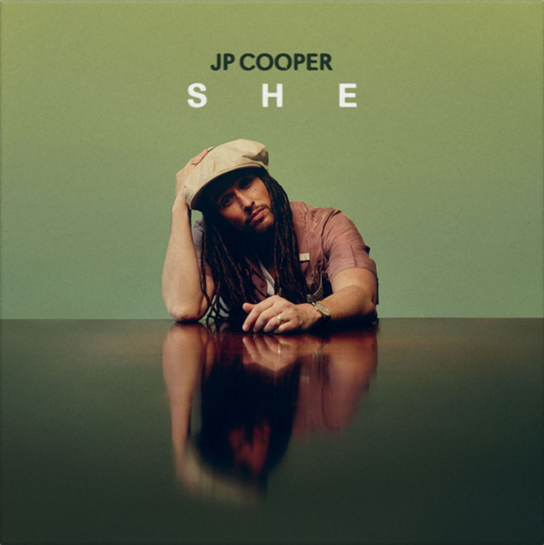 SHE cover art