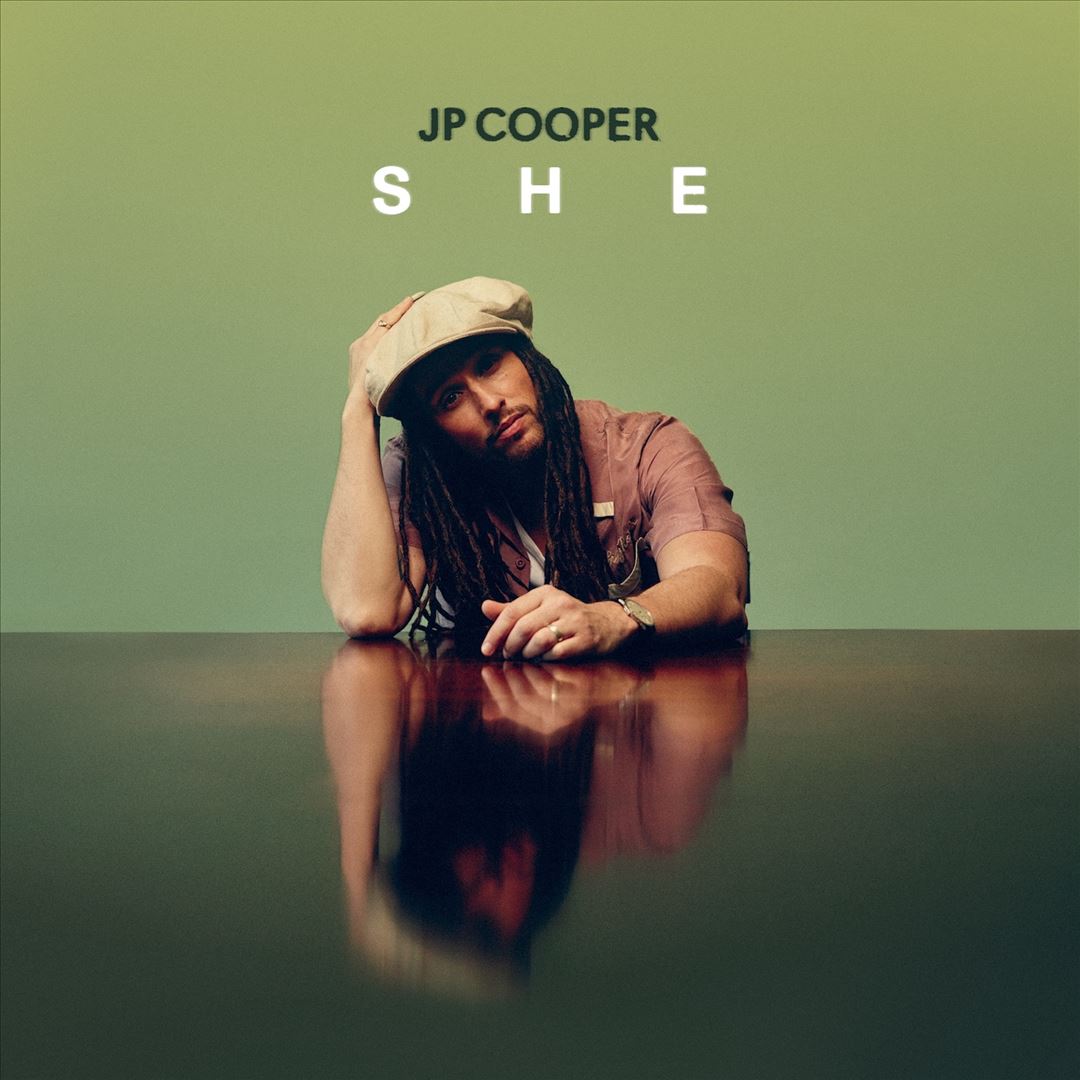 SHE cover art