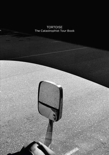 Catastrophist Tour Book cover art