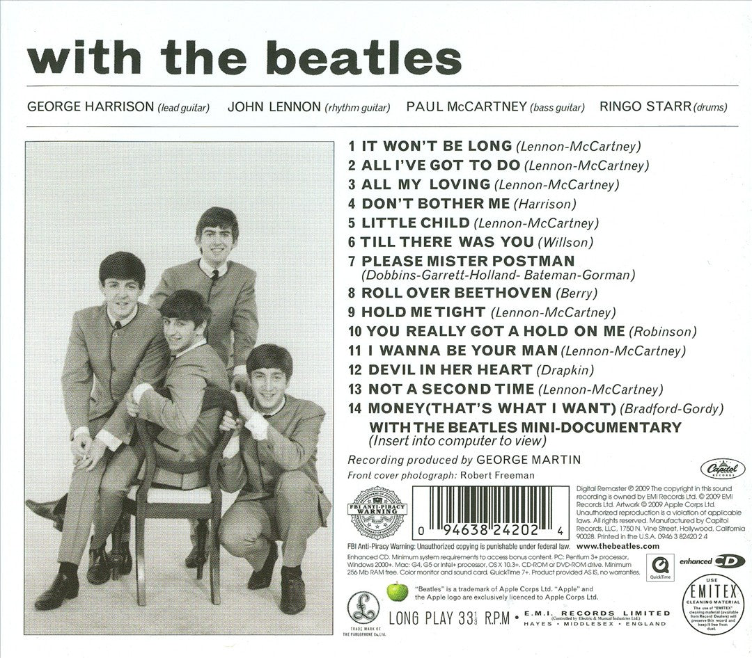 With the Beatles cover art